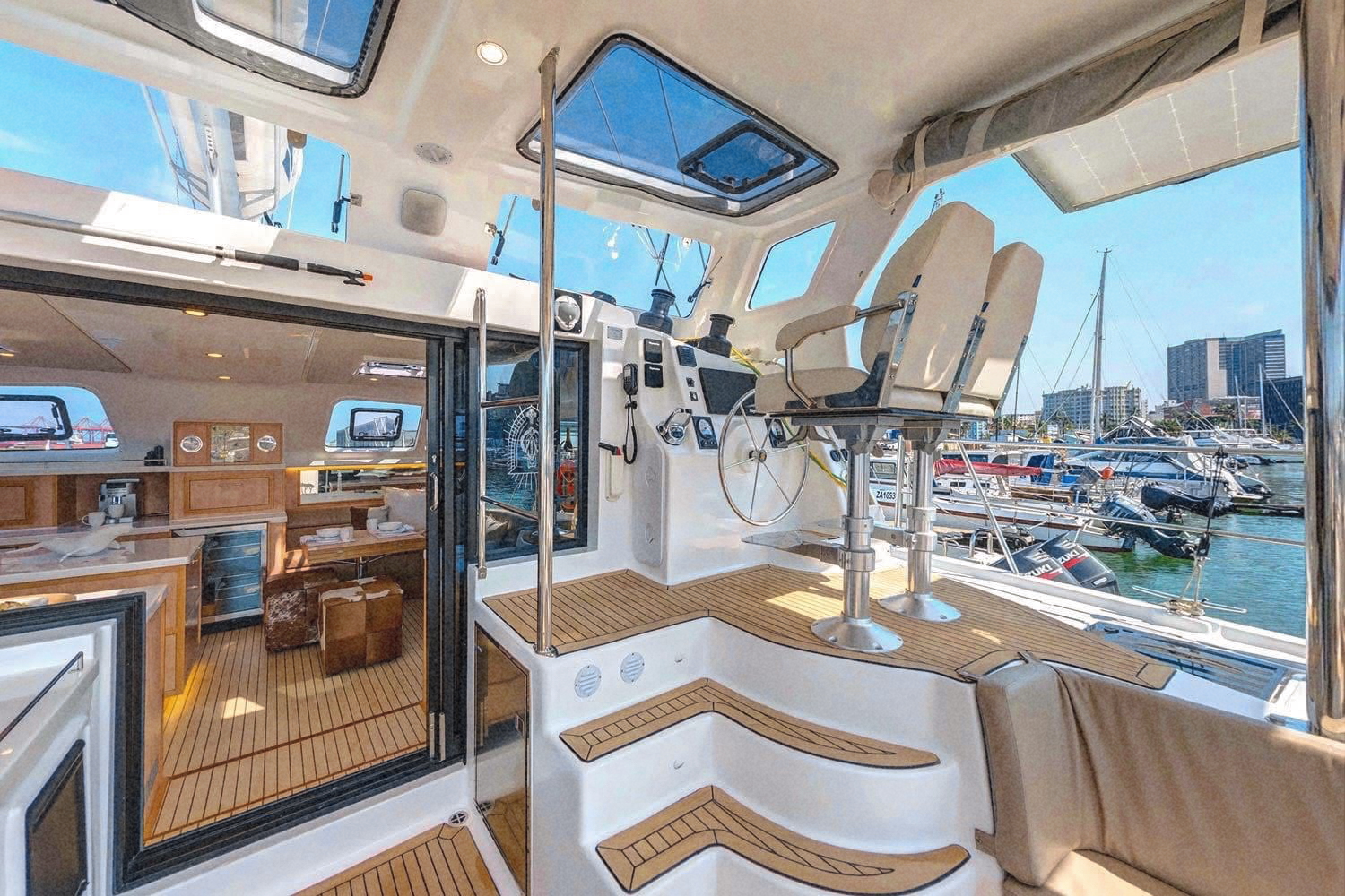 The helm station with twin seats under an open sky